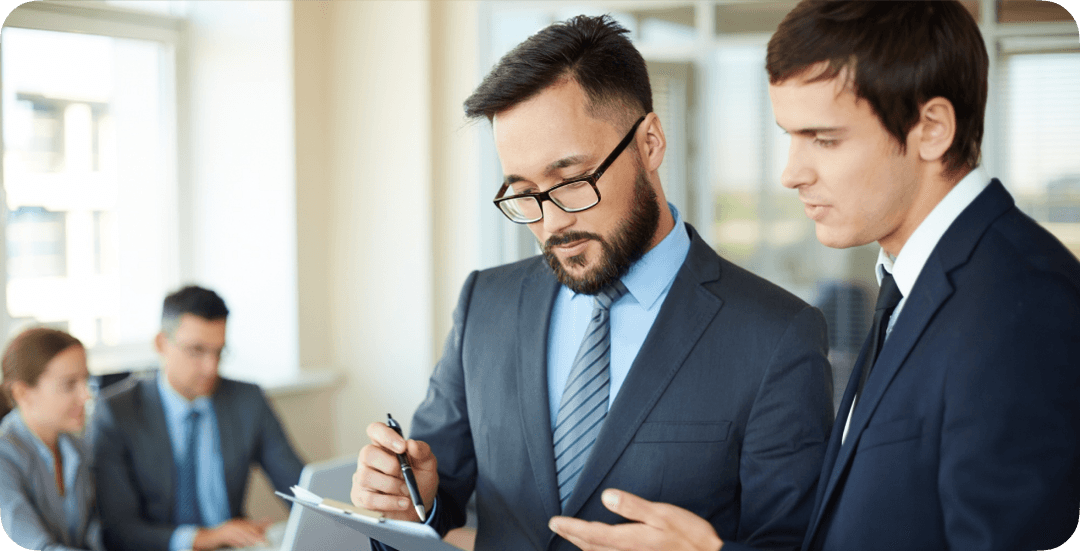 2-guys-looking-at-paper